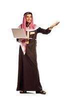 Young smiling arab with laptop isolated on white photo