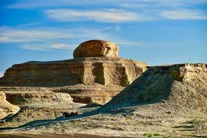 Ghost City in Xinjiang, China is a typical Yardang landform. photo