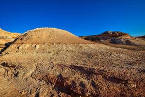 Trekking in The Wucai City Scenic Area near Urumqi, Xinjiang, has a magnificent and dazzling view of the Danxia landform. photo