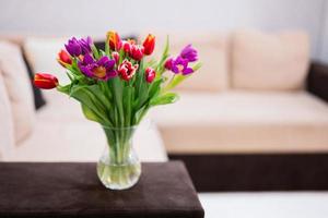 Spring tulip bouquet.  Holiday decor with flowers colorful tulips. photo