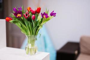 Spring tulip bouquet.  Holiday decor with flowers colorful tulips. photo