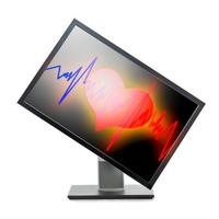 Monitor with heart on screen. photo