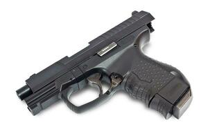 Hand gun on white background photo