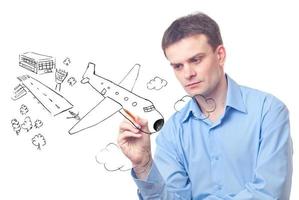 Businessman drawing  plane photo