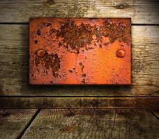 Wooden background with metal insert photo