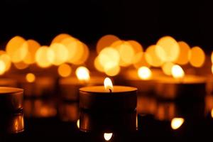 Burning candles with shallow depth of field photo