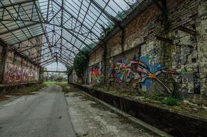 graffiti on factory wall photo