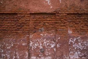 Old historical building brick wall grunge pattern texture can be used as a background wallpaper photo