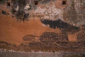 Old historical building brick wall Grunge patterns can be used as a texture background wallpaper photo