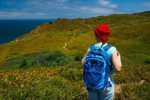 Young woman hiking photo