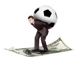 Soccer ball and money photo