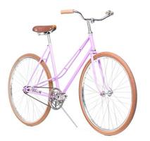 Stylish womens pink bicycle isolated on white photo