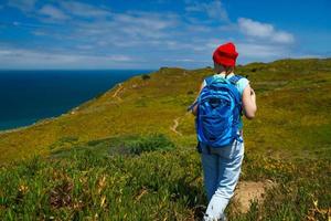 Young woman hiking photo