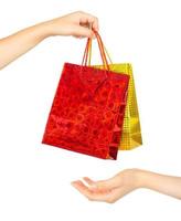 Woman's hands with shopping bags photo