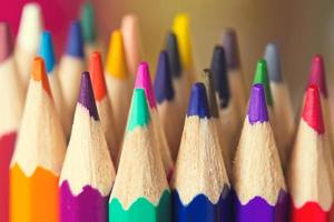 Colored pencils closeup as background photo