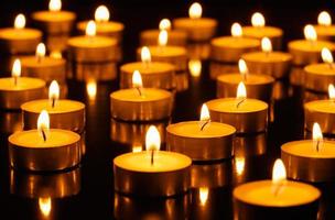 Many burning candles with shallow depth of field photo