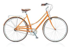 elegante hembra naranja bicicleta aislado en blanco foto