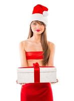 Smiling christmas girl with green placard on white photo