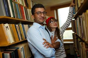 Young couple at the library photo