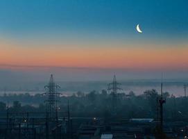 Power lines in the misty dawn photo