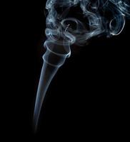 Abstract light smoke on dark background photo