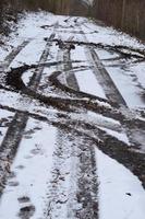 tire tracks in the snow photo