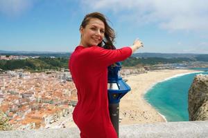 Woman by a beautiful coast photo