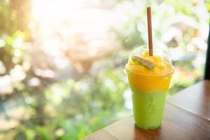 Melon and mango Smoothie on table, photo