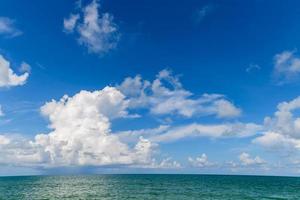 Beautiful white cloud and Blue Sky with sea at Mai Khao Beach Phuket, photo