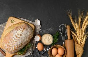 freshly baked sourdough bread with fresh egg and accessories photo