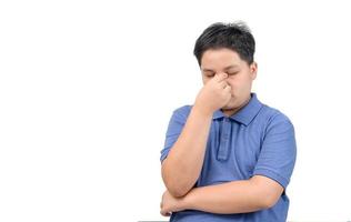 Obese boy feel stressed or  headache isolated on white background, photo