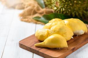 Chani Kai Durian or Durio zibthinus murray on wood plate, Chani Kai Durian have a soft texture, sweet and very strong smell, KIng of fruits in thailand photo