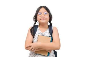 cute asian girl student wear eye glasses and  hold book isolated photo