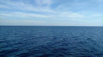 Dark sea and light blue sky photo