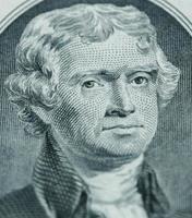 President Thomas Jefferson face on us two dollar bill closeup macro photo