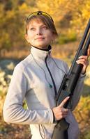 Girl with a shotgun photo