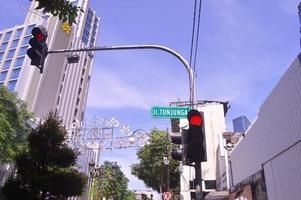 surabaya, indonesia, 2022 - selective focus on traffic lights on Jalan Tunjungan Surabaya photo