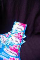 gresik, indonesia, 2023 - downy sachet fragrance with black background photo