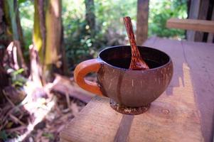 shot on glass made of coconut shell photo