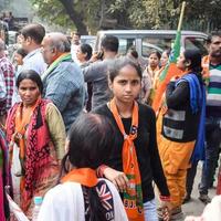 Delhi, India, December 02 2022 -Bharatiya Janata Party BJP supporter during mega road show in support of BJP candidate Pankaj Luthara to file nomination papers ahead of MCD local body Elections 2022 photo