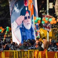 New Delhi, India - January 16 2023 - Prime Minister Narendra Modi cut out during BJP road show, the statue of PM Modi while attending a big election rally in the capital photo