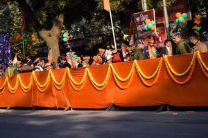 New Delhi, India - January 16 2023 - Thousands of people collected during Prime Minister Narendra Modi BJP road show, people during PM Modi big election rally in the capital photo