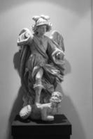 monochrome photography of religious statue angel photo