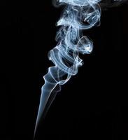 Abstract light smoke on a black background photo