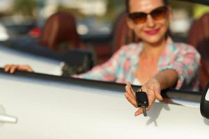 Young woman with new car photo