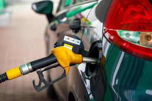 Car refueling on a petrol station photo