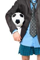 Businessman in his underwear with soccer ball photo