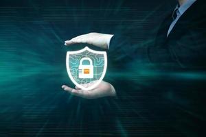 Technology privacy, Cyber data protection, Cyber security network, Shield protection icon and internet technology networking. Businessman hand showing security icon on virtual display. photo