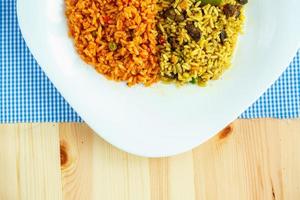 Dish made of two kinds of rice on a white plate photo