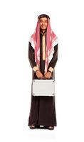 Young smiling arab with a aluminum case isolated on white photo